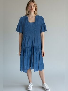 Sundance Teal Logo Label on Textured Blue Fabric